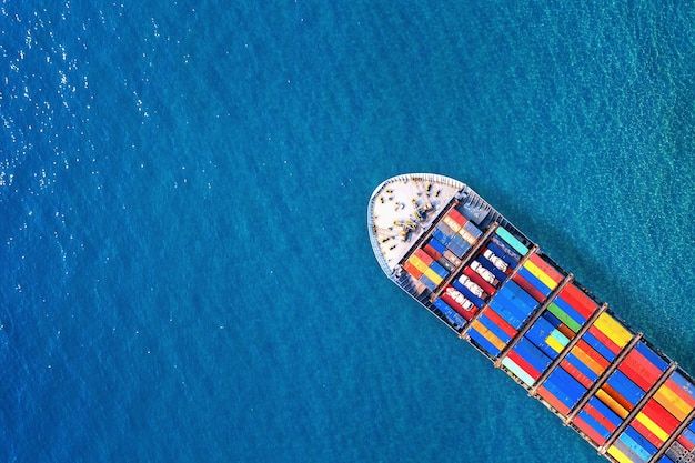 Free Photo _ Aerial view of container cargo ship in sea_ (1)
